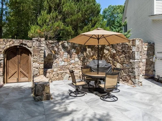 a view of a swimming pool with a lounge chair