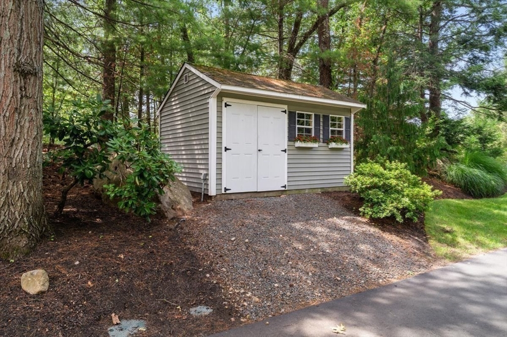 15 A Moccasin Path Natick, MA 01760 - Photo 35 of 42 a view of house with backyard and garden