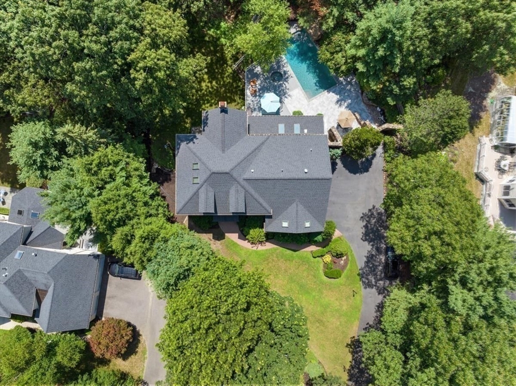 15 A Moccasin Path Natick, MA 01760 - Photo 36 of 42 an aerial view of a house with yard swimming pool and outdoor seating