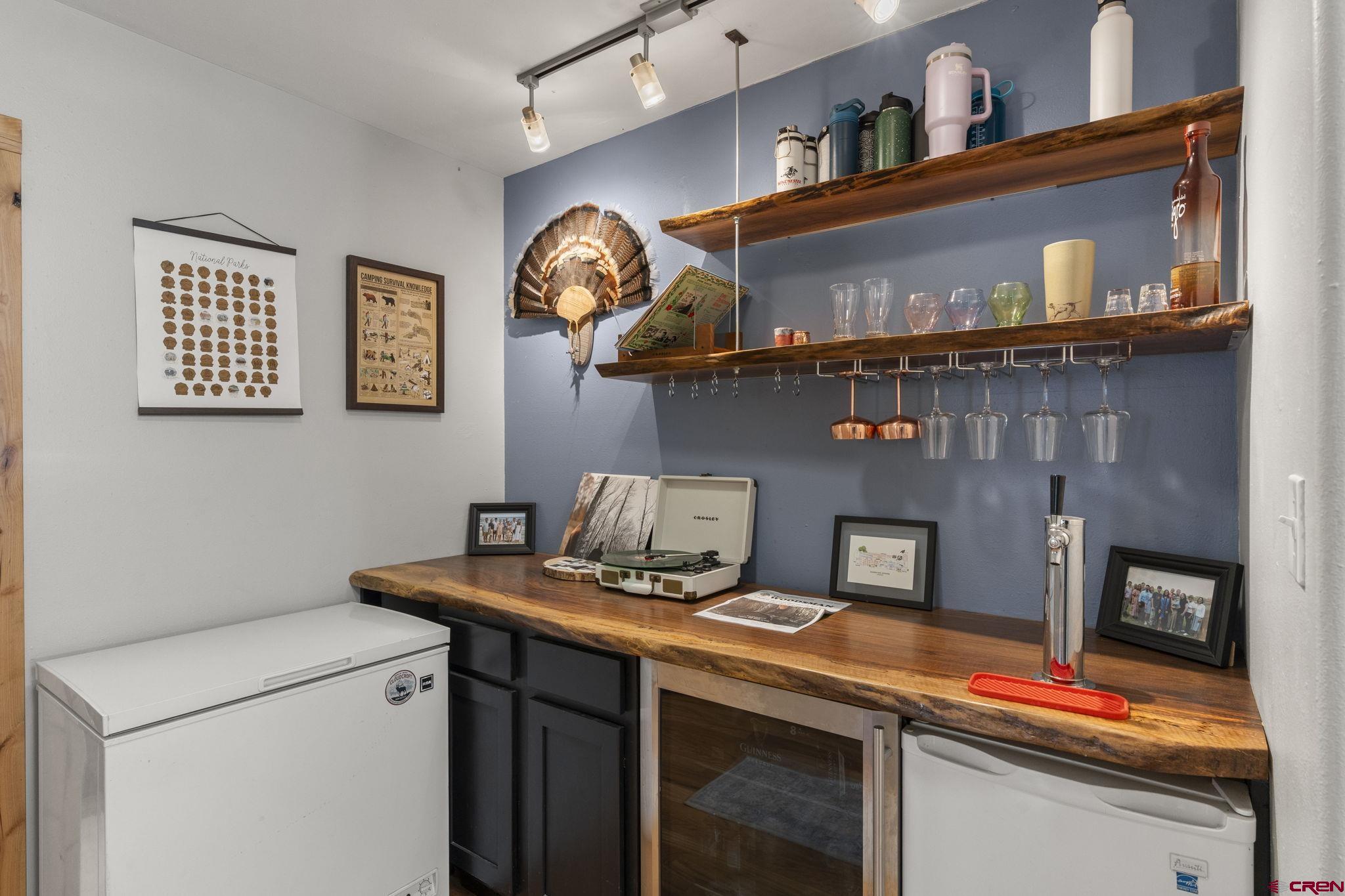 31 Valley View Way Durango, CO 81303 - Photo 17 of 29 a room with a stove and a wall painting