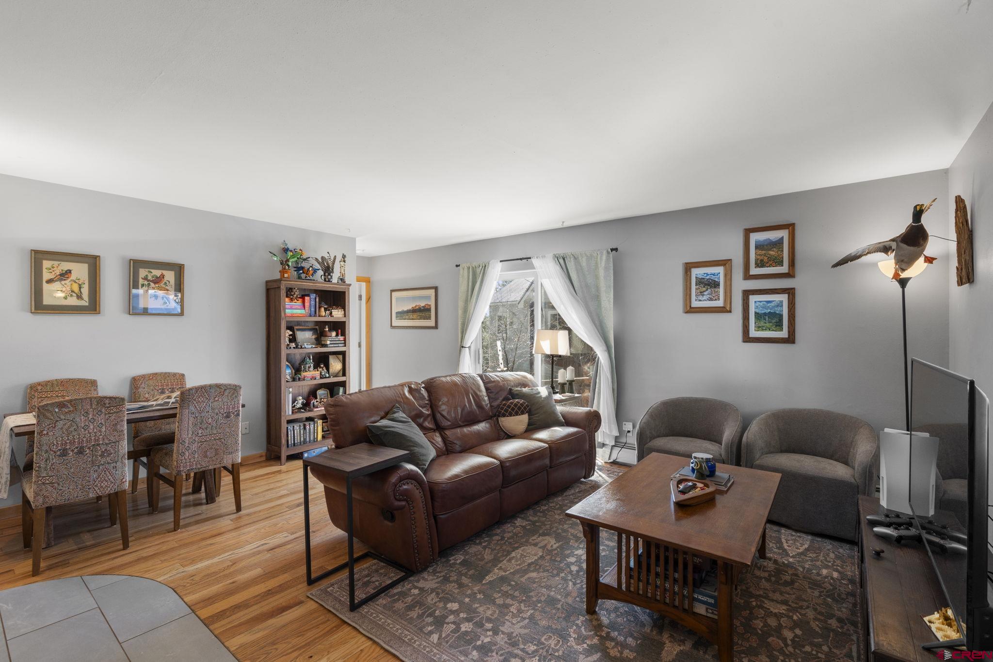 31 Valley View Way Durango, CO 81303 - Photo 3 of 29 a living room with furniture a rug and a window