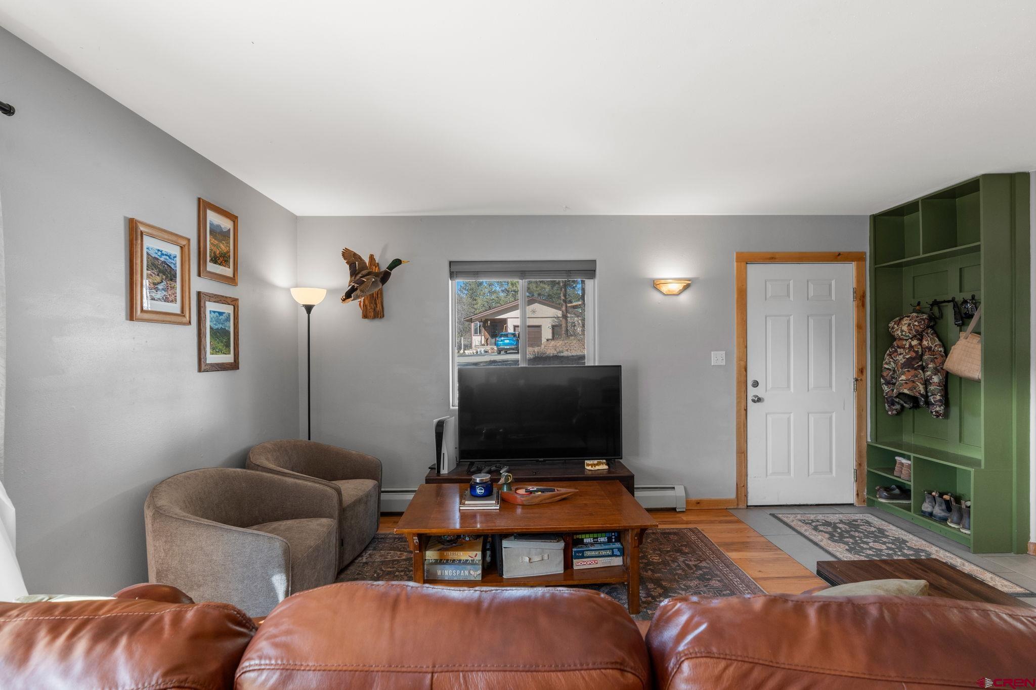 31 Valley View Way Durango, CO 81303 - Photo 5 of 29 a bedroom with furniture and a flat screen tv