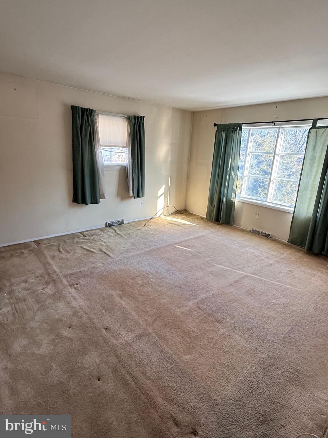 1446 Fitzwatertown Road Willow Grove, PA 19090 - Photo 14 of 19 a view of an empty room with a window