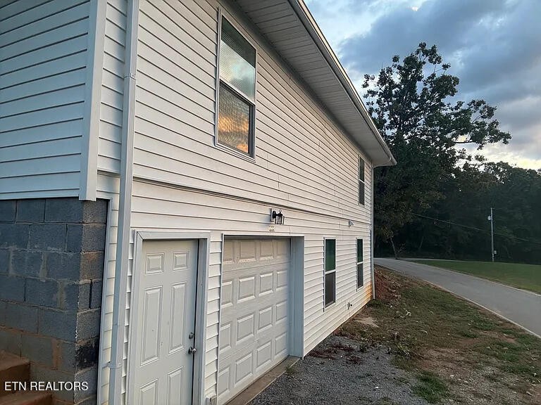 309 Hobson Road Kingston, TN 37763 - Photo 2 of 12 a view of a house with a yard