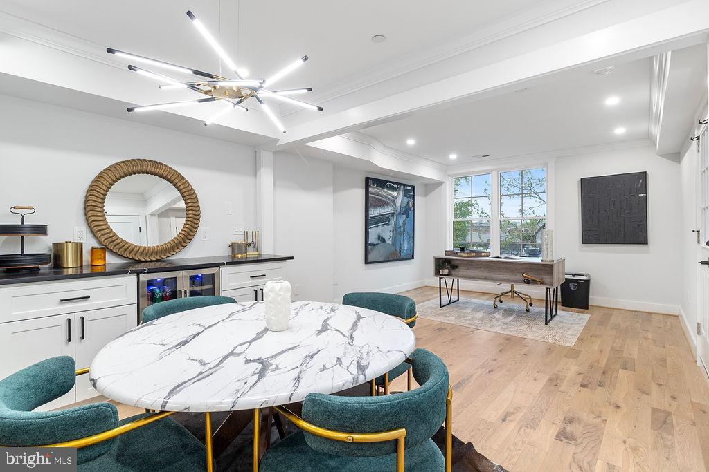 1242 Meigs Place Northeast, Unit 3 Washington, DC 20002 - Photo 7 of 13 a view of a dining room with furniture and a large window