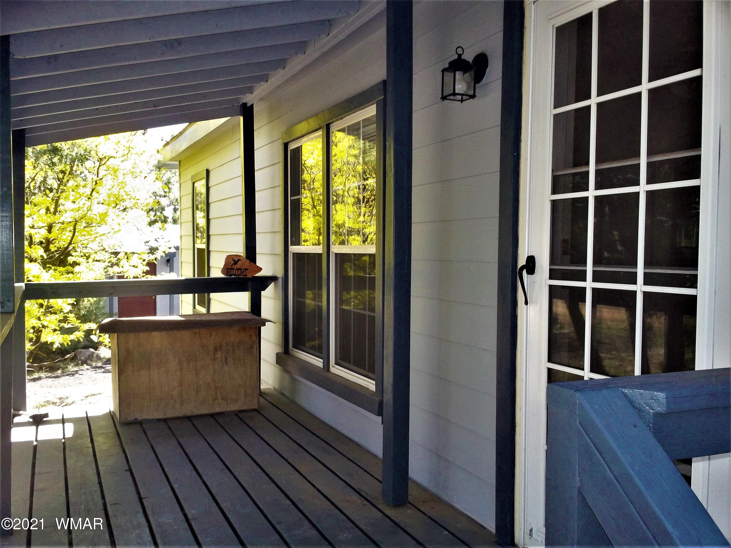 6 N3097 Vernon, AZ 85940 - Photo 12 of 40 a view of balcony with wooden floor