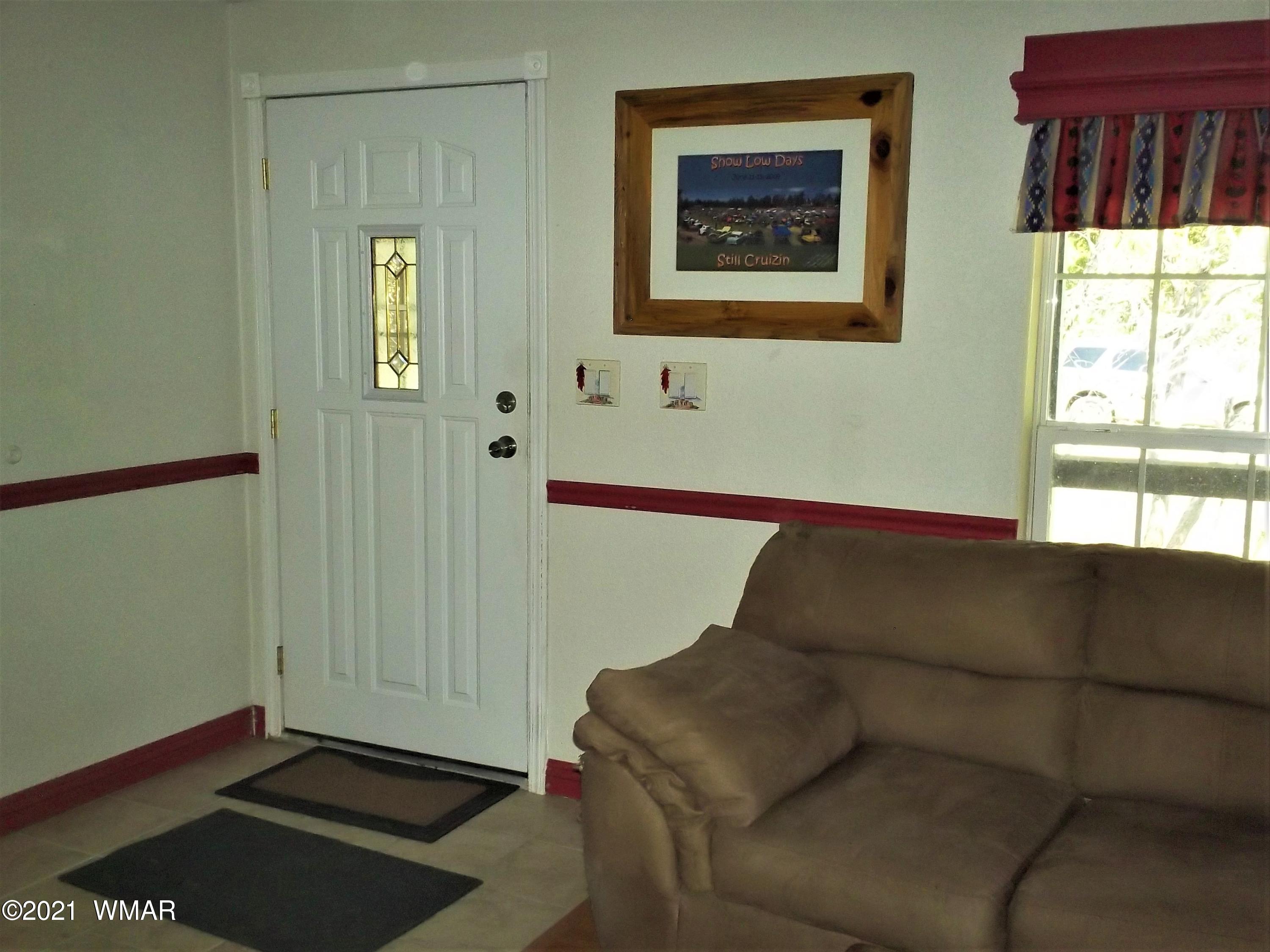 6 N3097 Vernon, AZ 85940 - Photo 16 of 40 a living room with furniture and a window