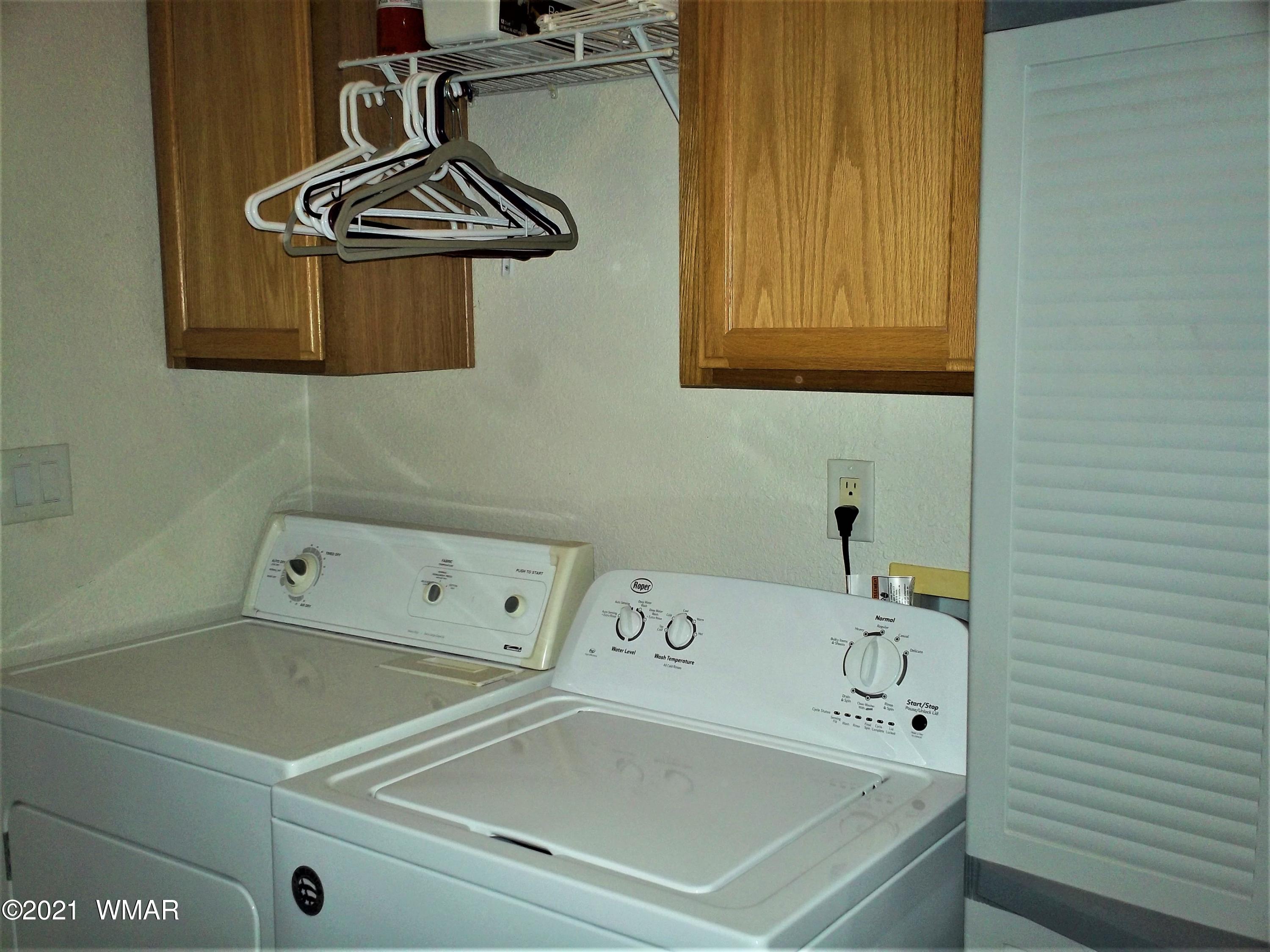 6 N3097 Vernon, AZ 85940 - Photo 23 of 40 a utility room with dryer and washer