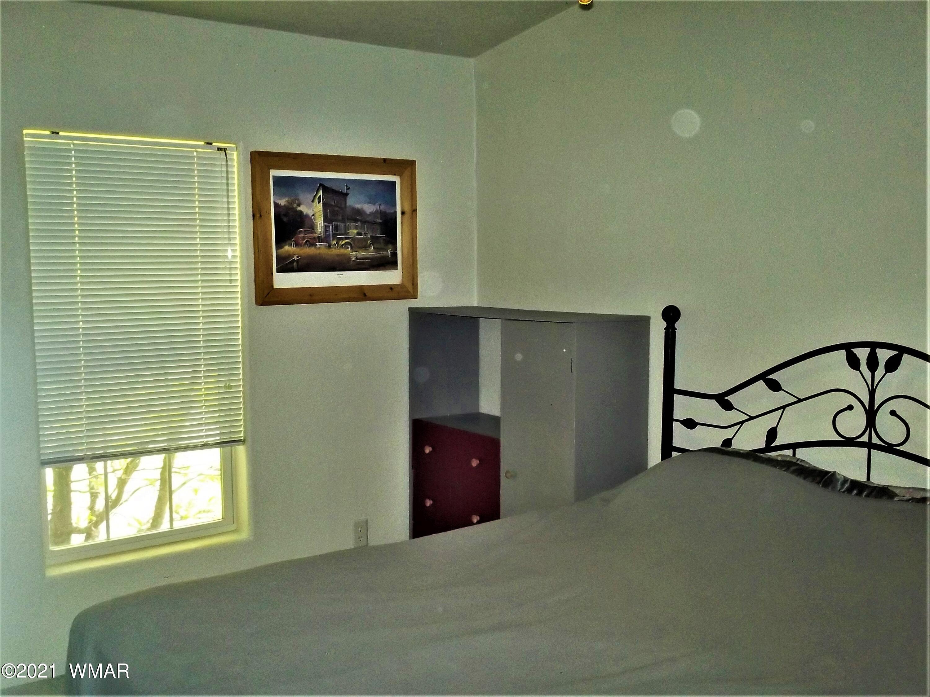 6 N3097 Vernon, AZ 85940 - Photo 35 of 40 a view of a room with air conditioner and a window