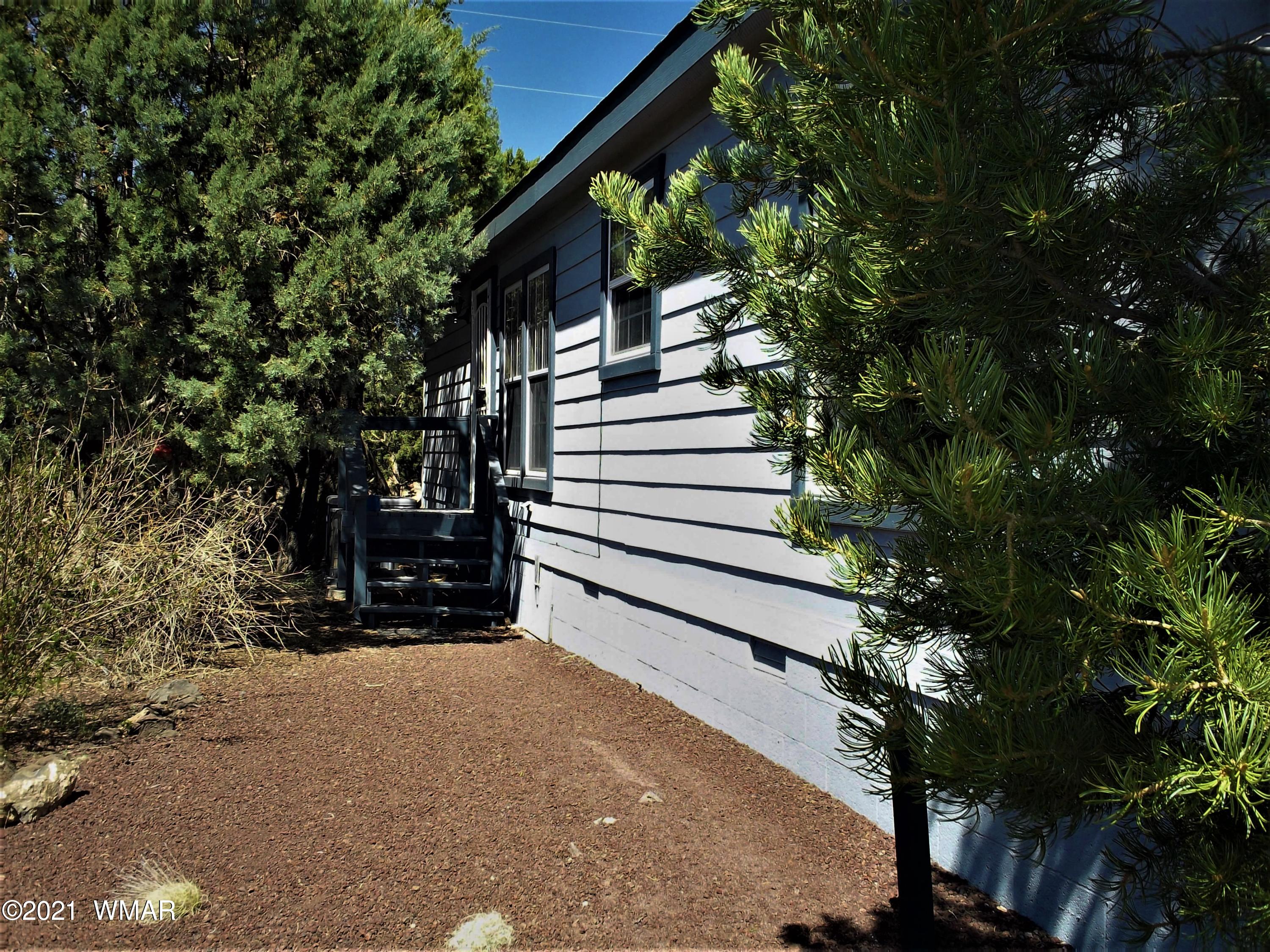 6 N3097 Vernon, AZ 85940 - Photo 6 of 40 a view of a house with a tree