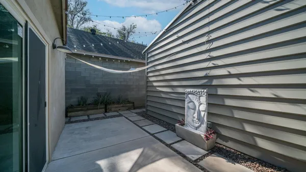 a view of a backyard with a deck
