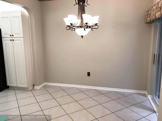 a view of a chandelier fan