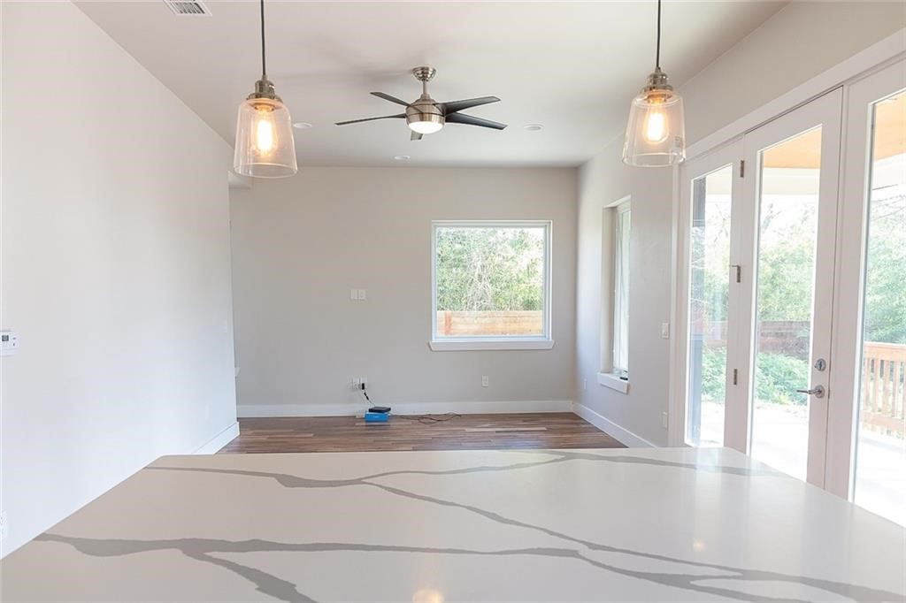 2509 Del Curto Road, Unit A Austin, TX 78704 - Photo 9 of 23 a view of a livingroom with a ceiling fan and window