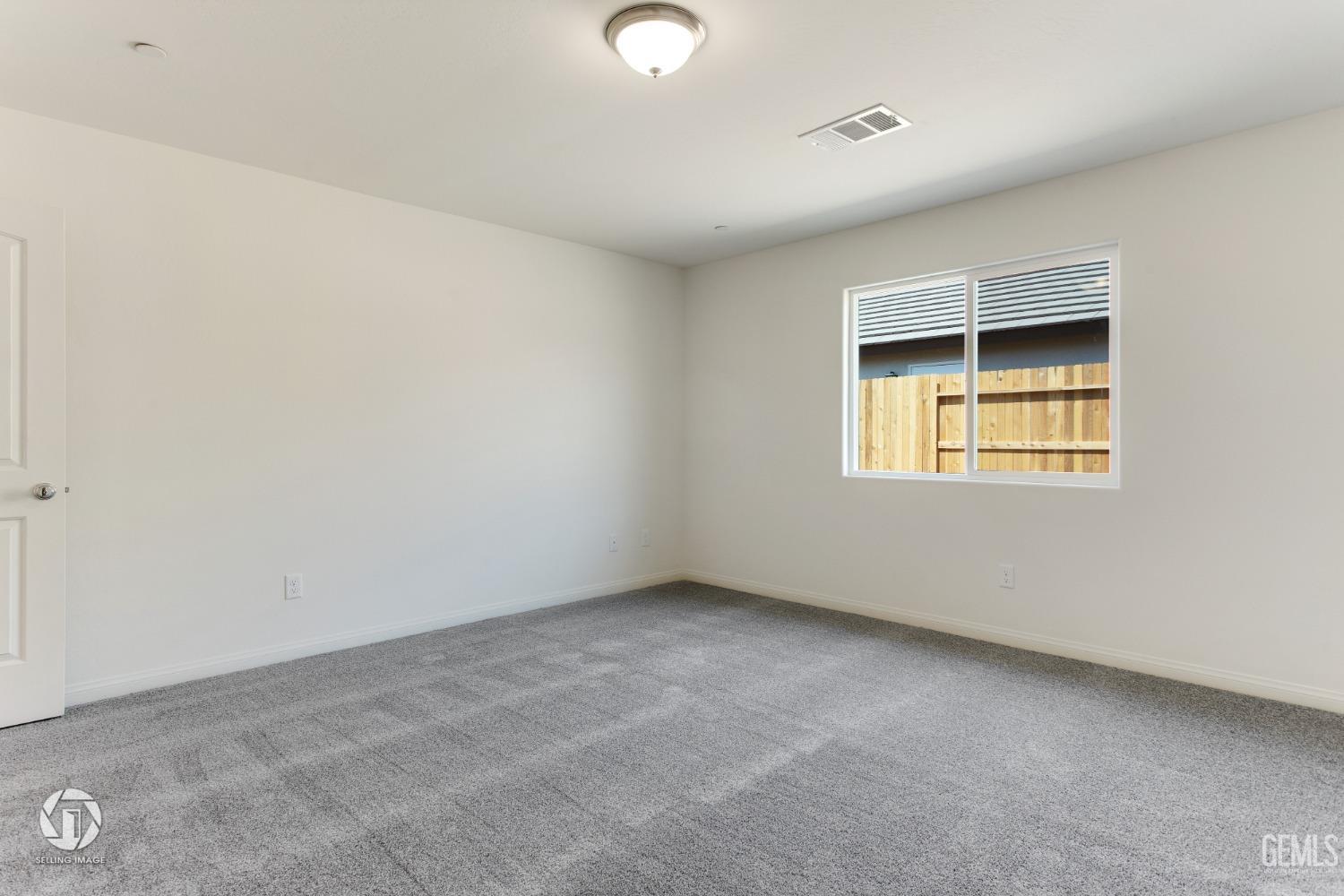 Undisclosed Address Shafter, CA 93263 - Photo 21 of 33 an empty room with a window