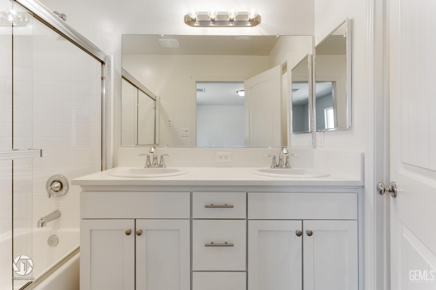Undisclosed Address Shafter, CA 93263 - Photo 23 of 33 a bathroom with a sink and a mirror