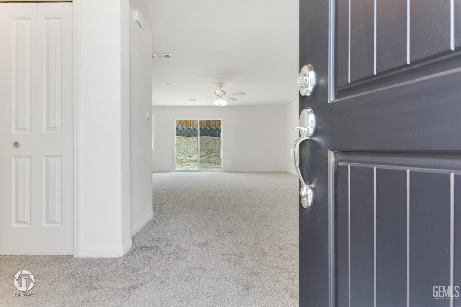 Undisclosed Address Shafter, CA 93263 - Photo 5 of 33 a view of livingroom with furniture and entryway
