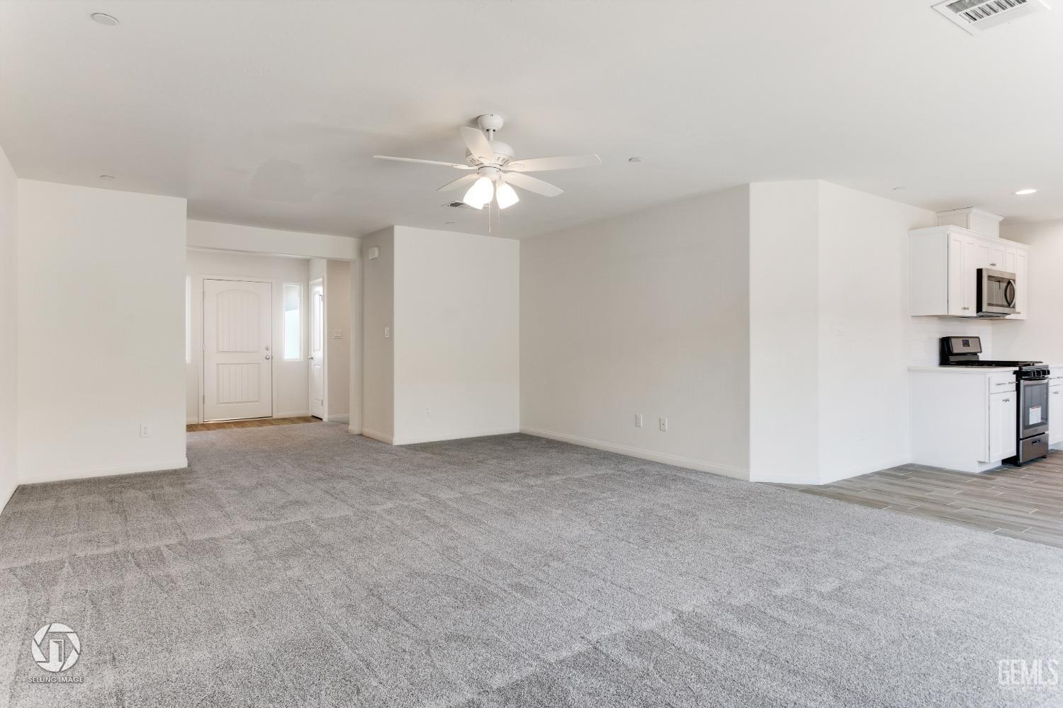 Undisclosed Address Shafter, CA 93263 - Photo 9 of 33 an empty room with closet and windows