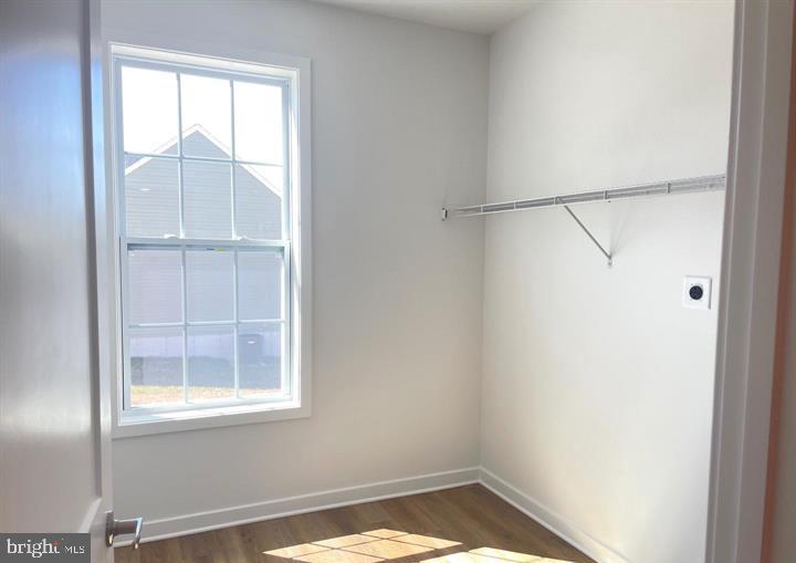 12 Glenaire Road Bunker Hill, WV 25413 - Photo 6 of 31 a view of an empty room with a window