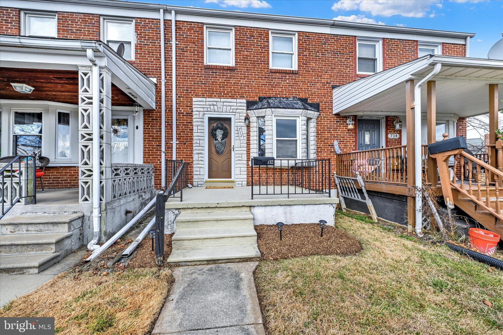 712 Arncliffe Road Essex, MD 21221 - Photo 1 of 20 freshly manicured front lawn