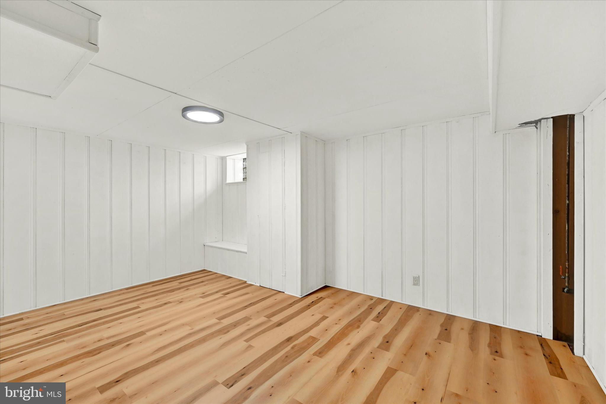 712 Arncliffe Road Essex, MD 21221 - Photo 16 of 20 Brand new LVP and fresh paint in basement