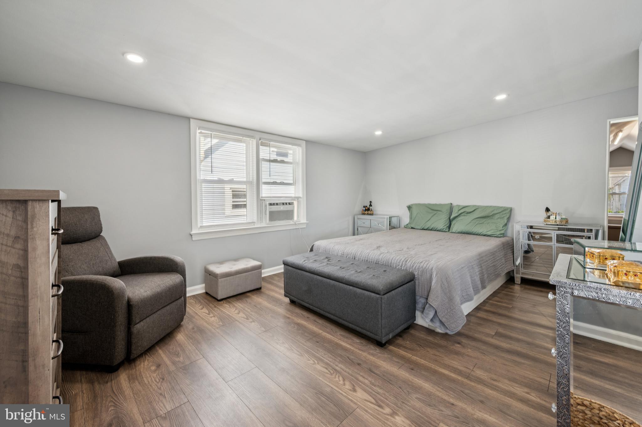 259 Hooker Street Riverside, NJ 08075 - Photo 20 of 25 a bedroom with a bed and wooden floor