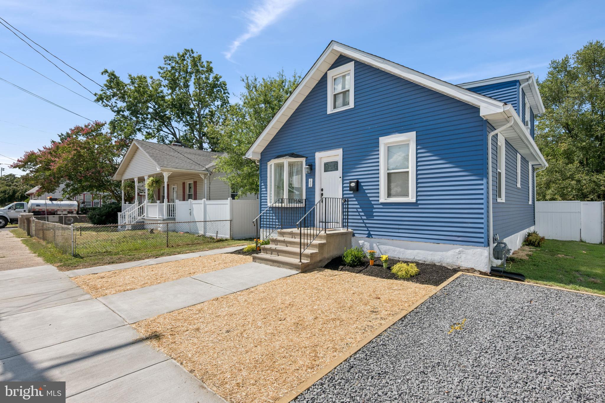 259 Hooker Street Riverside, NJ 08075 - Photo 2 of 25 a front view of a house with garden