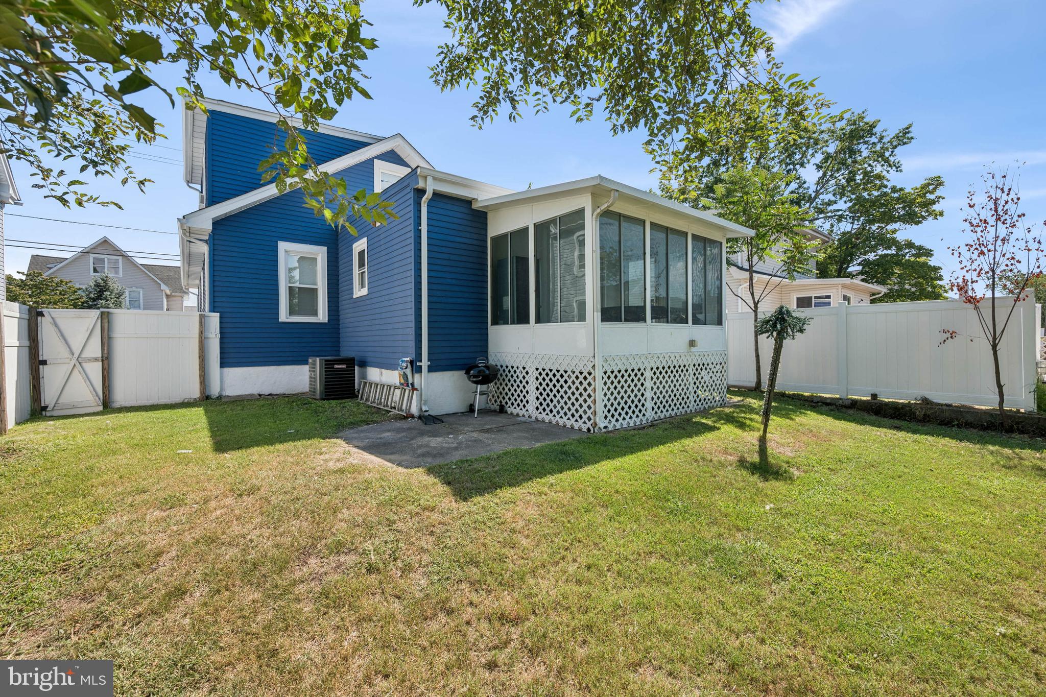 259 Hooker Street Riverside, NJ 08075 - Photo 25 of 25 a house that has a tree in front of it