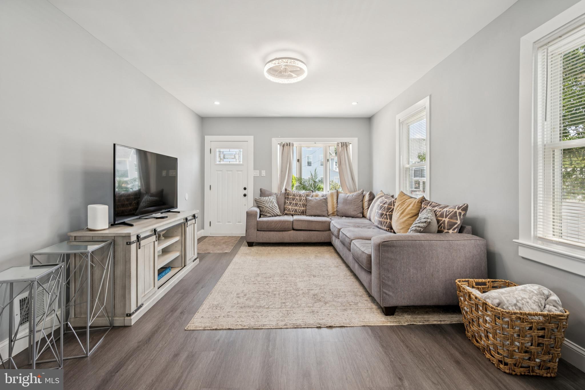 259 Hooker Street Riverside, NJ 08075 - Photo 5 of 25 a living room with furniture and a flat screen tv