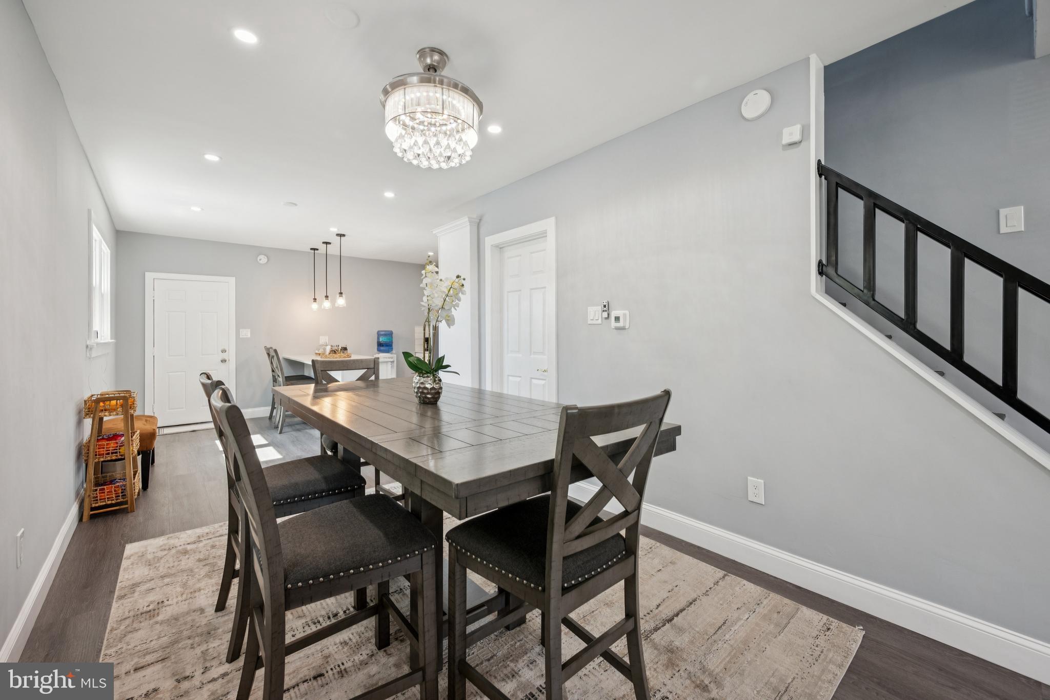 259 Hooker Street Riverside, NJ 08075 - Photo 10 of 25 a view of a dining room with furniture and wooden floor