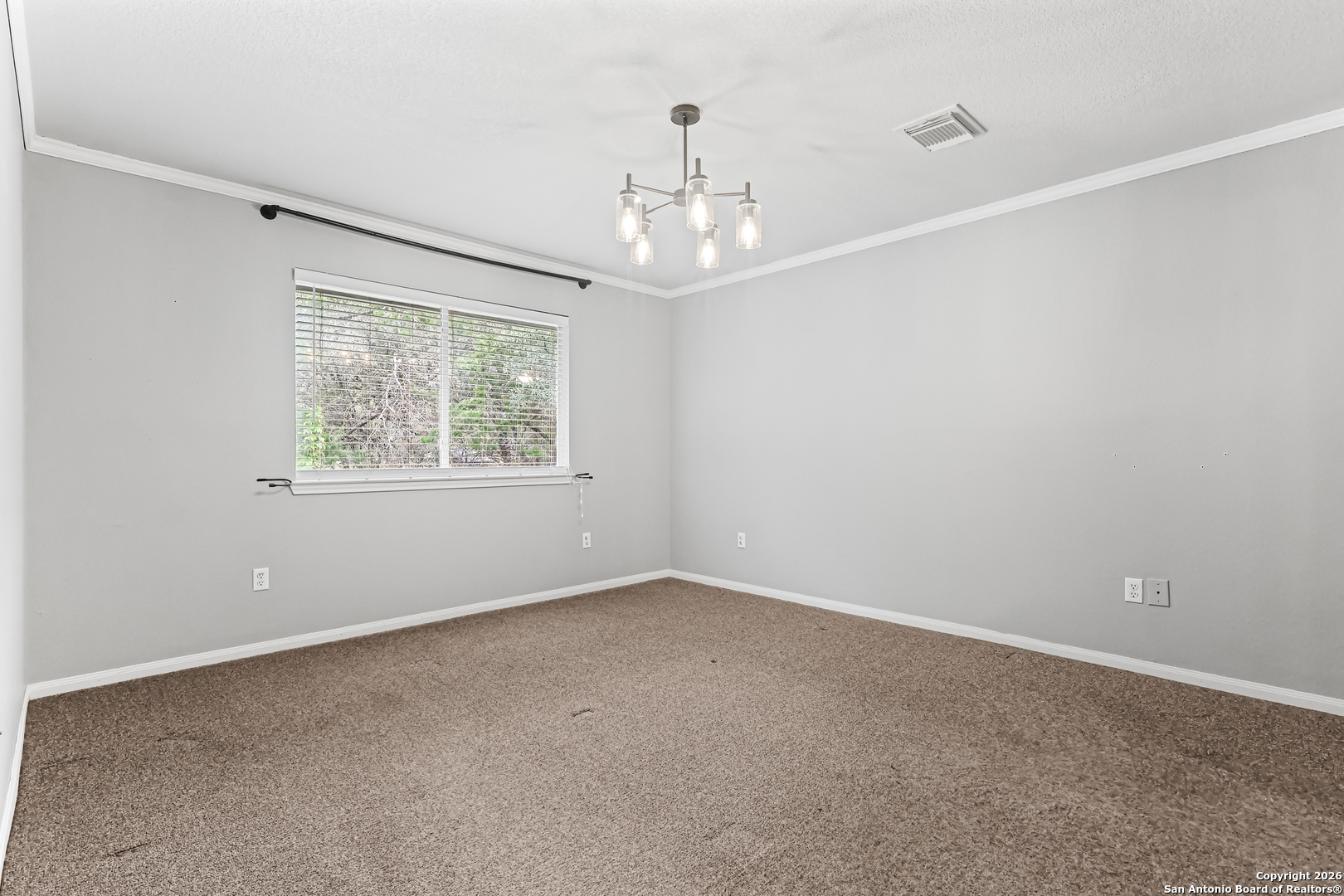 162 Canyon View Court Spring Branch, TX 78070 - Photo 27 of 44 a view of an empty room with a window
