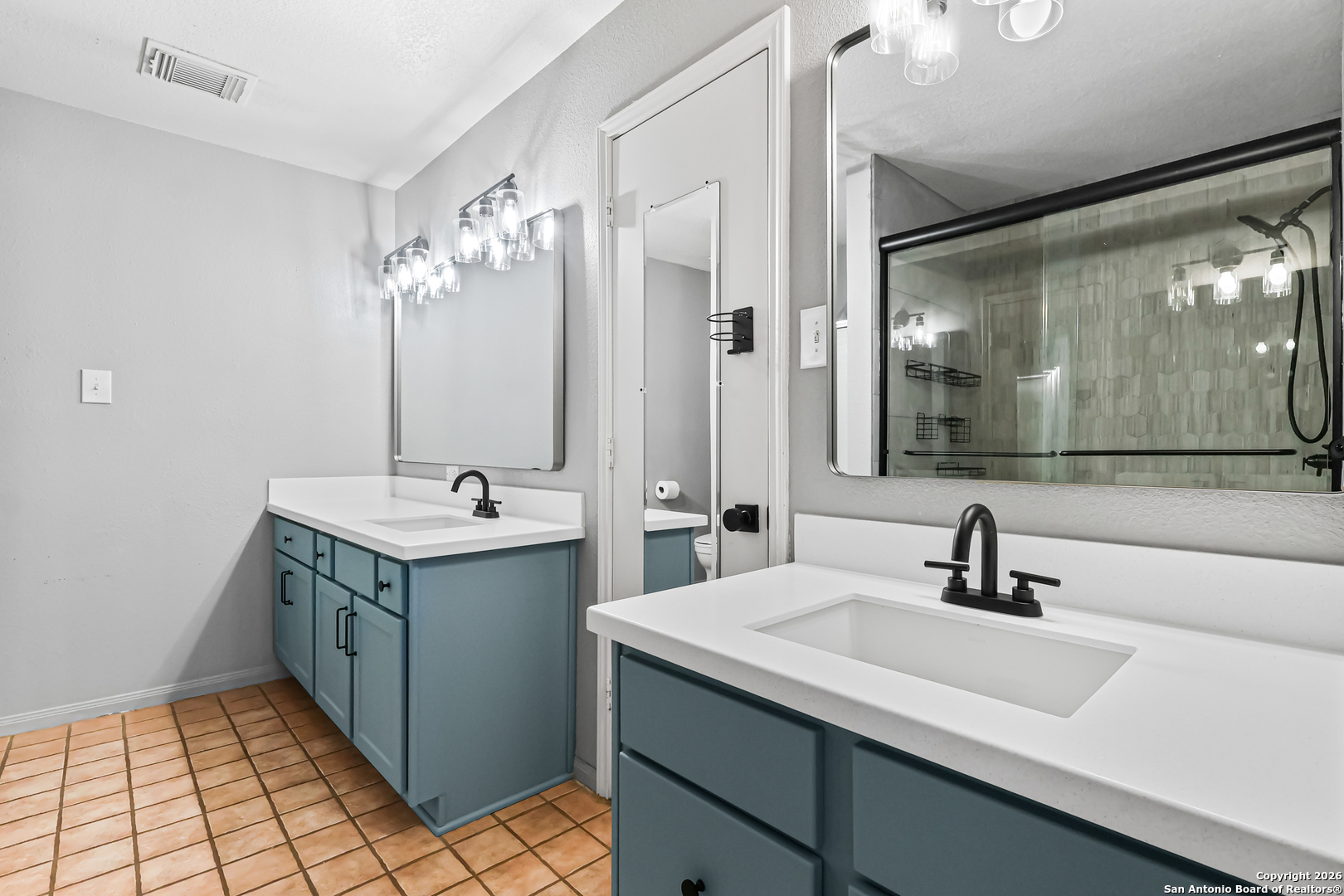 162 Canyon View Court Spring Branch, TX 78070 - Photo 29 of 44 a bathroom with a double vanity sink mirror and