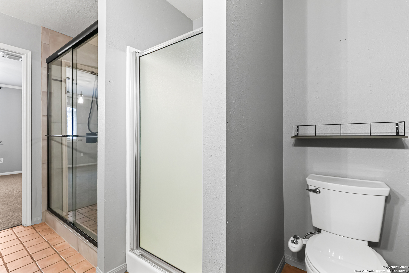 162 Canyon View Court Spring Branch, TX 78070 - Photo 31 of 44 a bathroom with a toilet and a shower