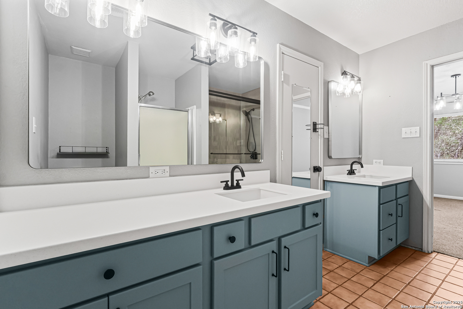 162 Canyon View Court Spring Branch, TX 78070 - Photo 32 of 44 a bathroom with a sink double vanity and a mirror