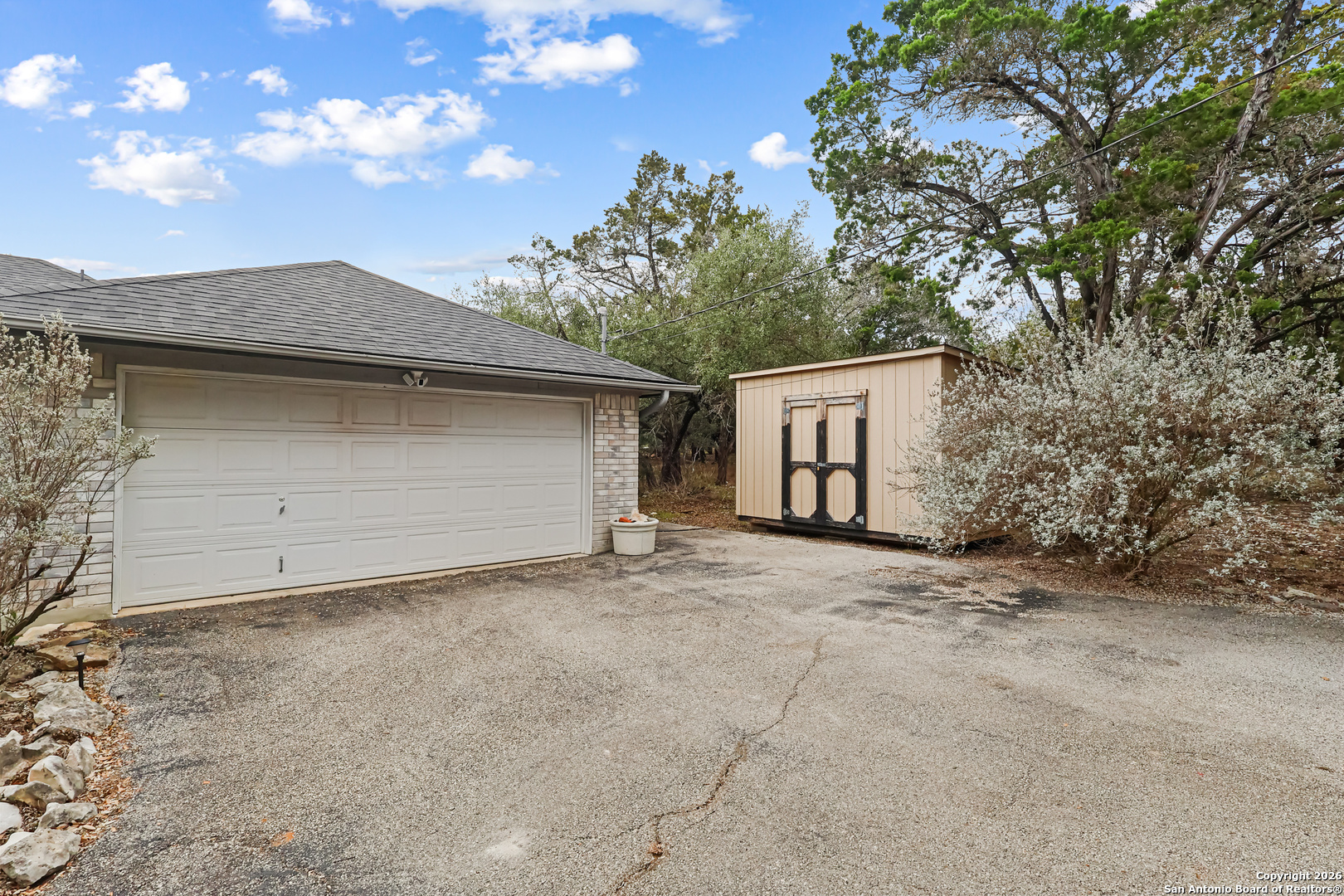 162 Canyon View Court Spring Branch, TX 78070 - Photo 34 of 44 a house with trees in the background