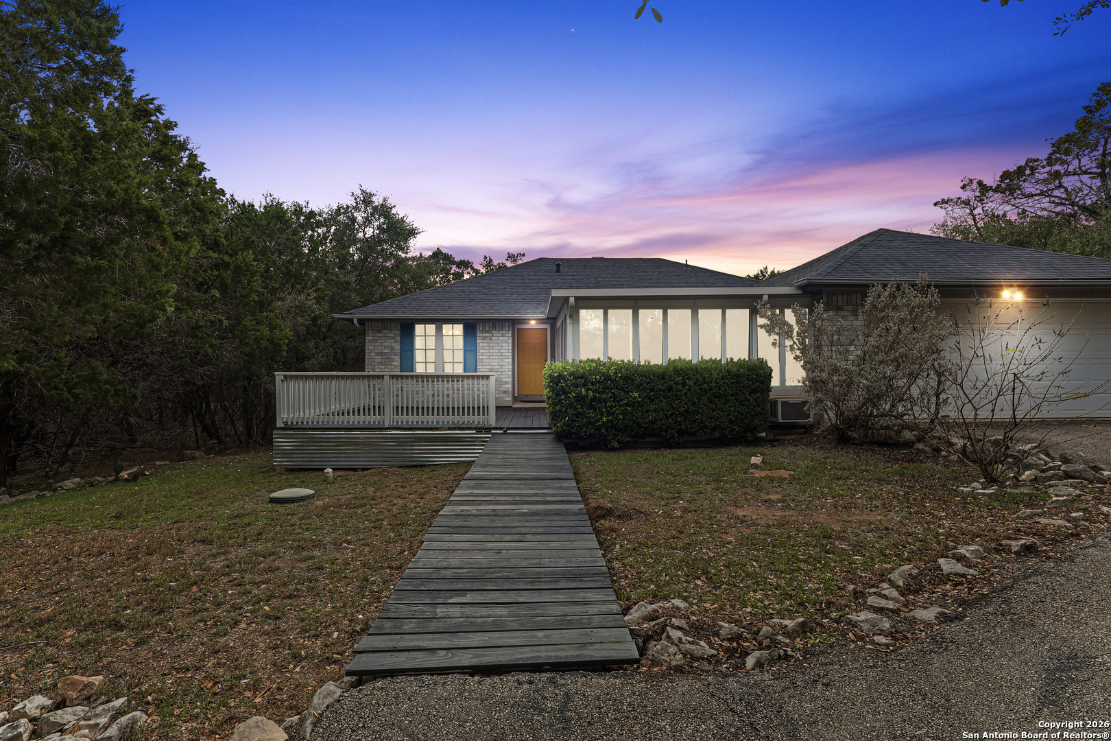162 Canyon View Court Spring Branch, TX 78070 - Photo 4 of 44 a view of a house with a yard
