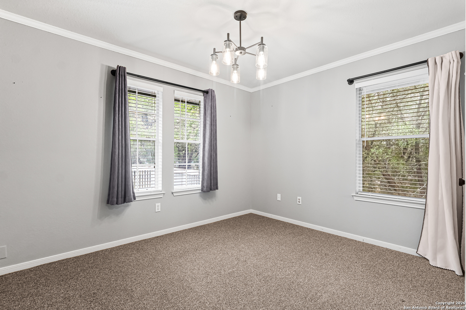 162 Canyon View Court Spring Branch, TX 78070 - Photo 8 of 44 a view of an empty room with a window
