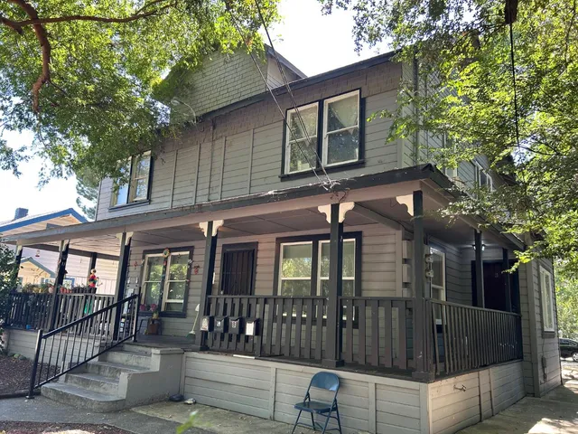 a front view of a house with balcony