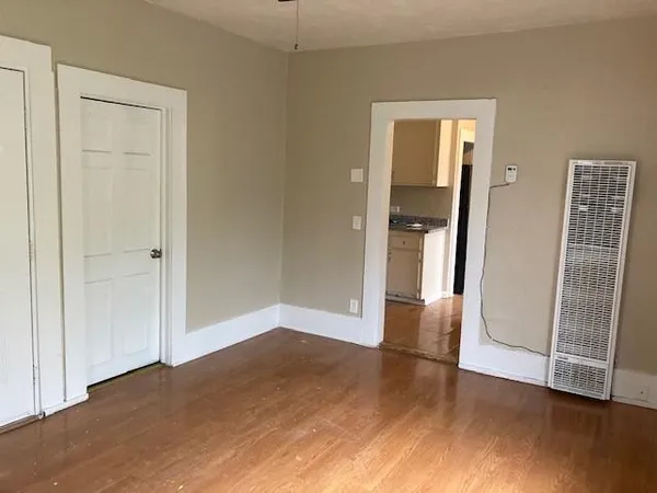 a view of entryway with wooden floor