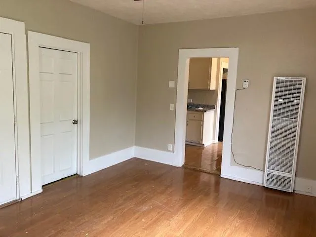 a view of entryway with wooden floor