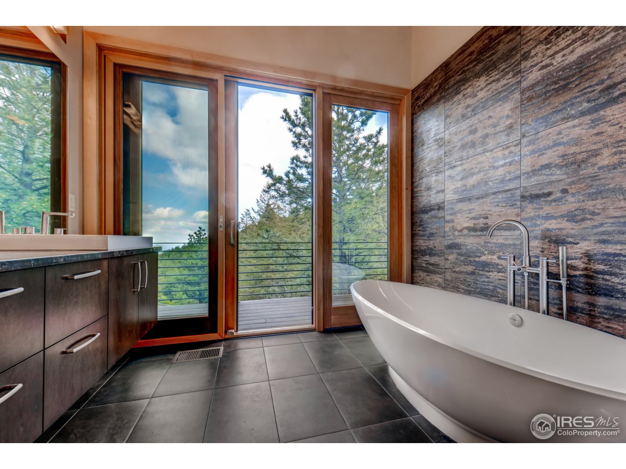 153 Brook Road Boulder, CO 80302 - Photo 13 of 25 a bathroom with a bathtub and a sink