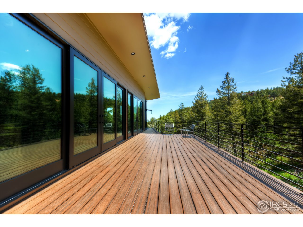 153 Brook Road Boulder, CO 80302 - Photo 21 of 25 a view of balcony with wooden floor and fence