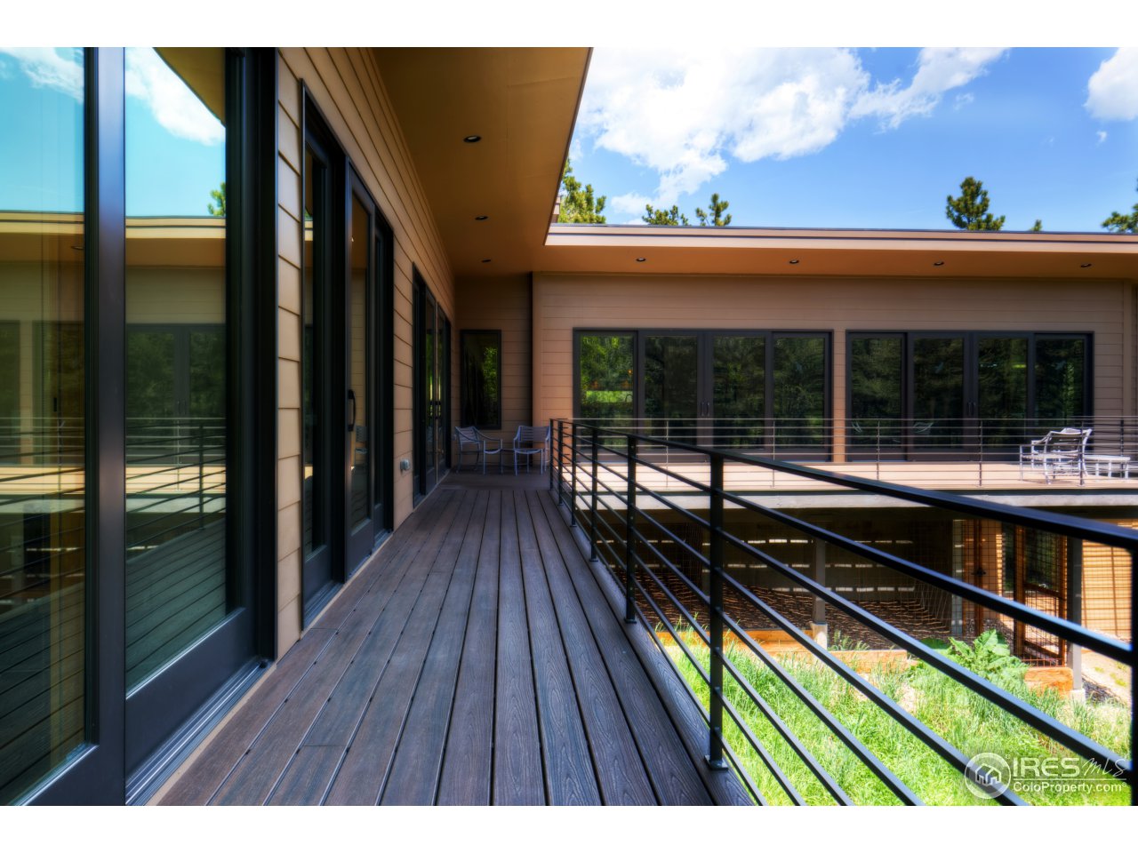 153 Brook Road Boulder, CO 80302 - Photo 23 of 25 a view of swimming pool with a balcony
