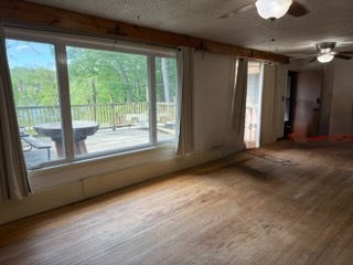 1843 North River Road Algonquin, IL 60102 - Photo 11 of 13 a view of a livingroom with an empty space and a fireplace