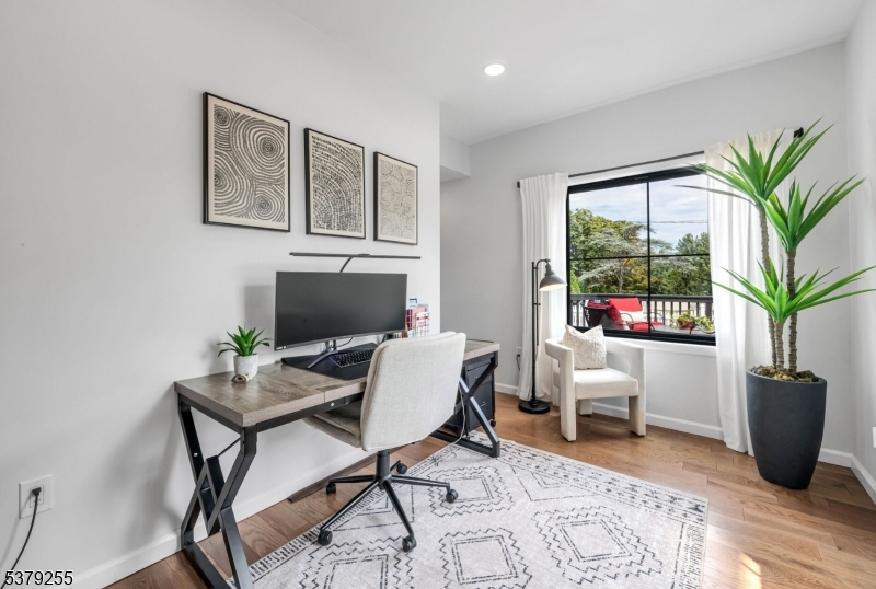 648 Black Oak Ridge Road Wayne, NJ 07470 - Photo 14 of 50 a workspace with furniture window and wooden floor
