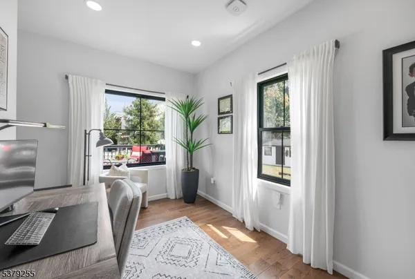 a room with furniture and a entryway