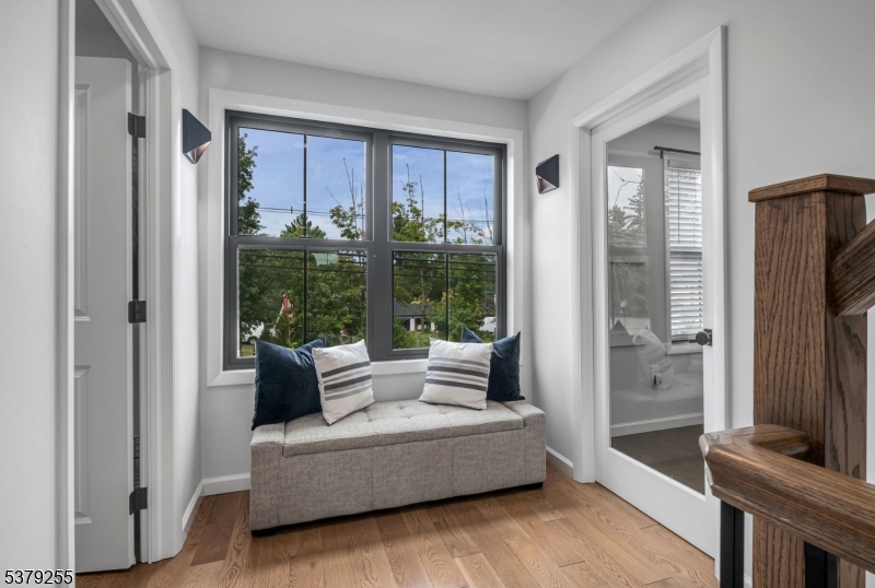 648 Black Oak Ridge Road Wayne, NJ 07470 - Photo 20 of 50 a living room with furniture and a flat screen tv