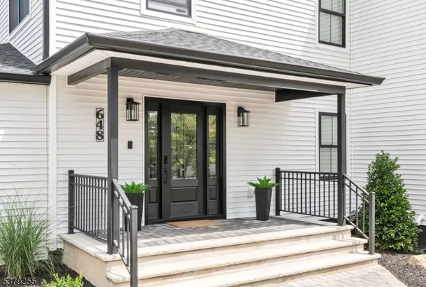a view of a house with a small porch