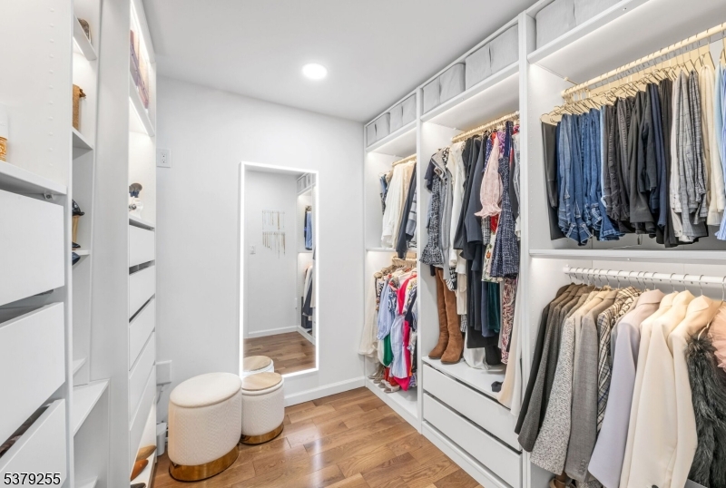 648 Black Oak Ridge Road Wayne, NJ 07470 - Photo 25 of 50 a view of walk in closet with clothes and shoes