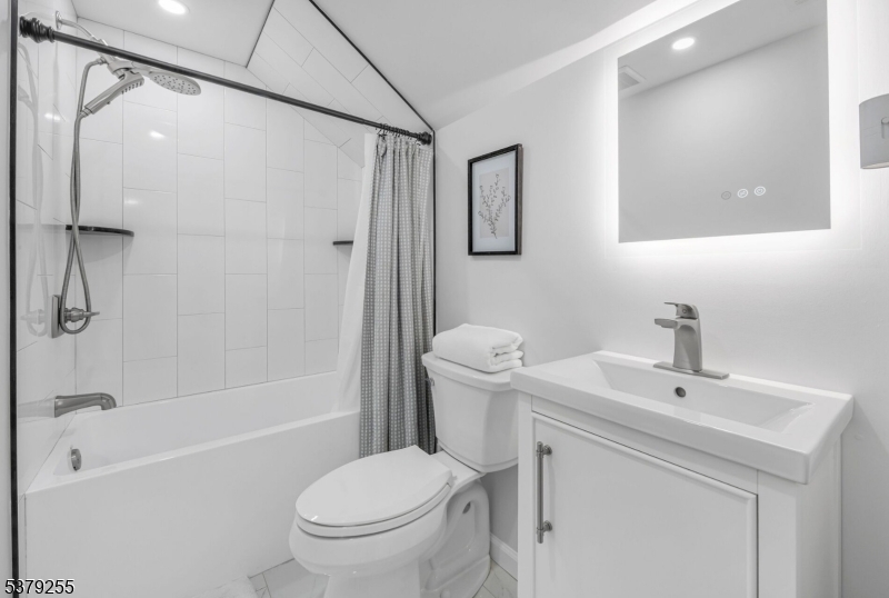 648 Black Oak Ridge Road Wayne, NJ 07470 - Photo 32 of 50 a bathroom with a sink toilet and shower