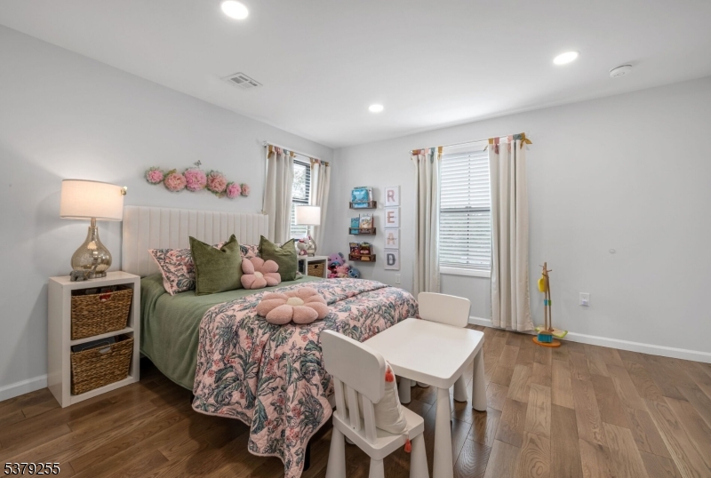 648 Black Oak Ridge Road Wayne, NJ 07470 - Photo 33 of 50 a bed room with a bed and a tv